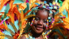 Notting Hill Carnival begins with burst of colour